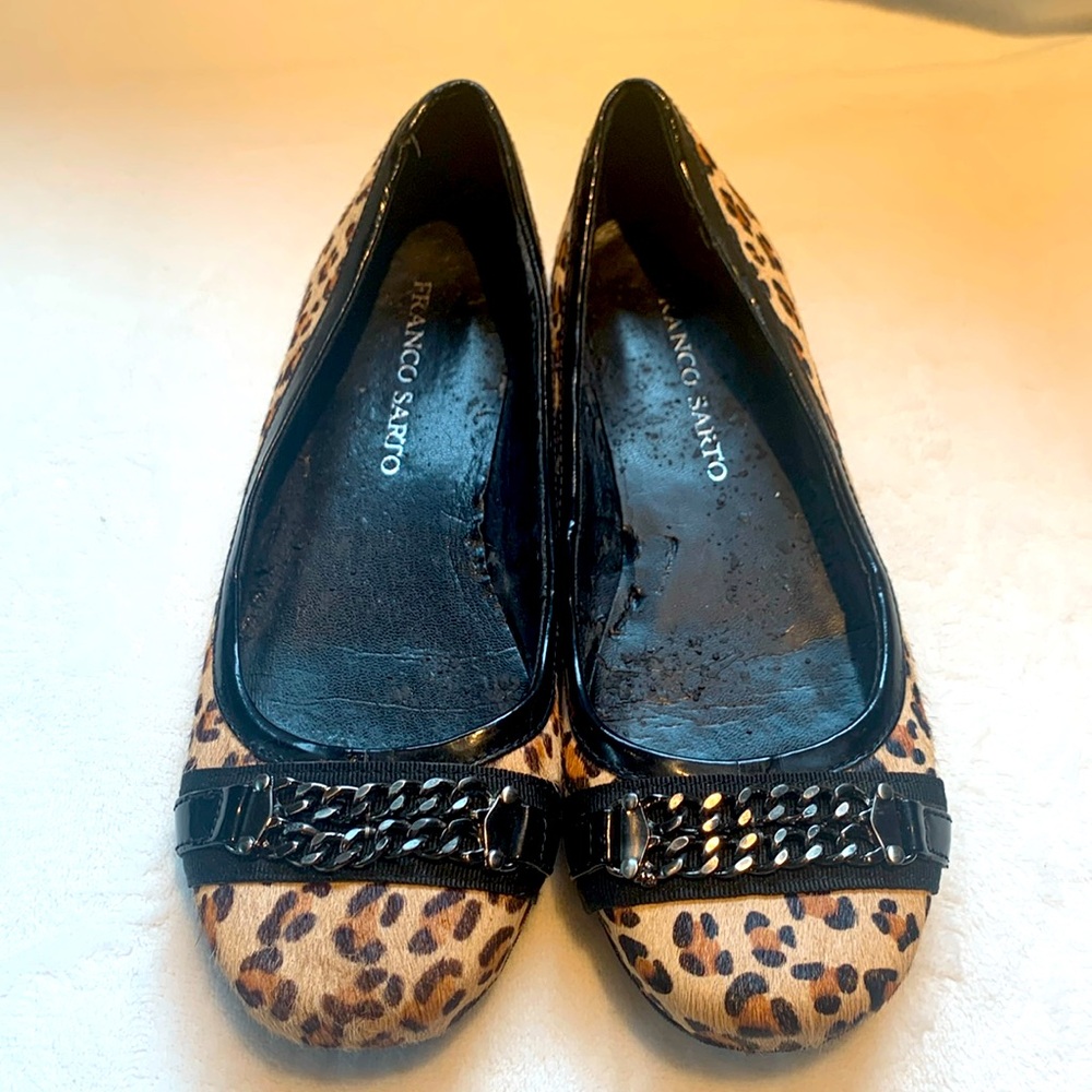 Franco Sarto leopard flats with chain detail.